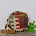 Baizaar jute/suede bag:  round crossbody